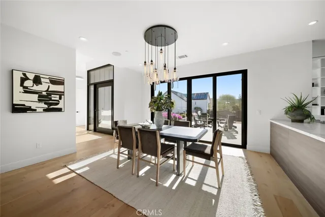 a white bath tub sitting in a bathroom next to a window