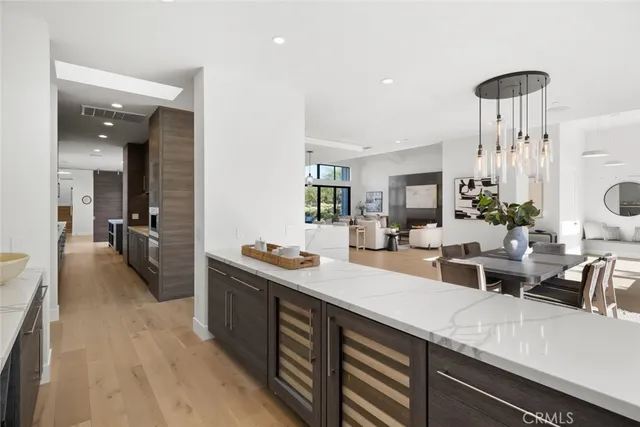 a bedroom with a large bed and a large window