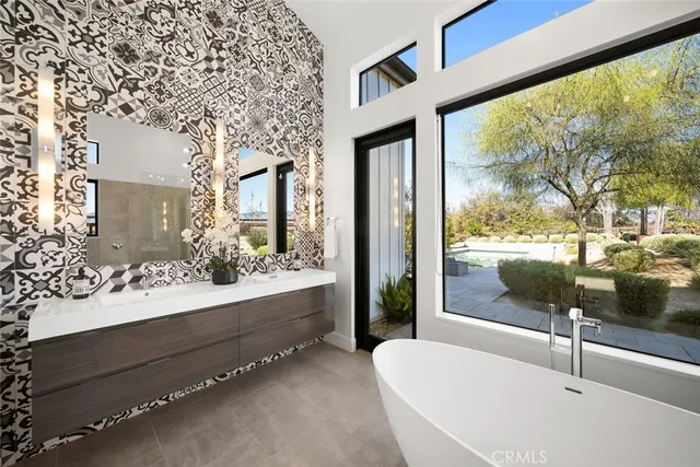 a bed room with a bed and a window