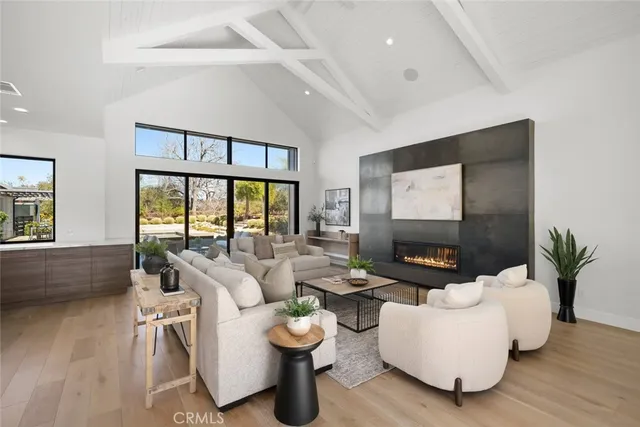 a backyard of a house with outdoor seating