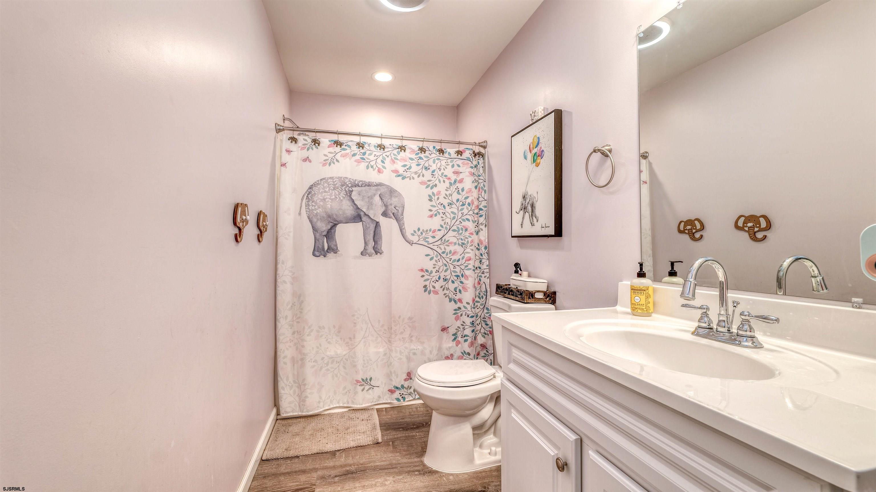 130 Stage Road Little Egg Harbor, NJ 08087 - Photo 26 of 50 a bathroom with a sink toilet and shower