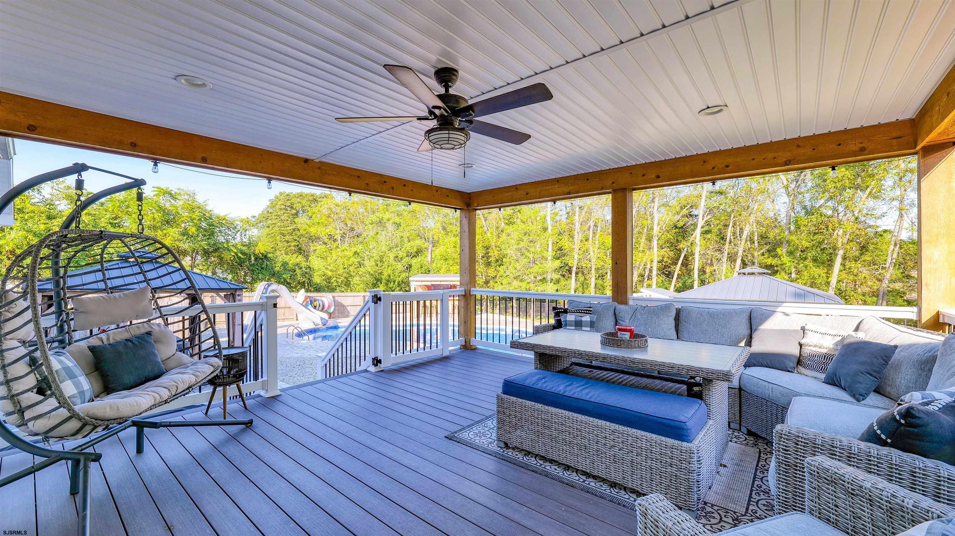 130 Stage Road Little Egg Harbor, NJ 08087 - Photo 39 of 50 a living room with furniture and a large window