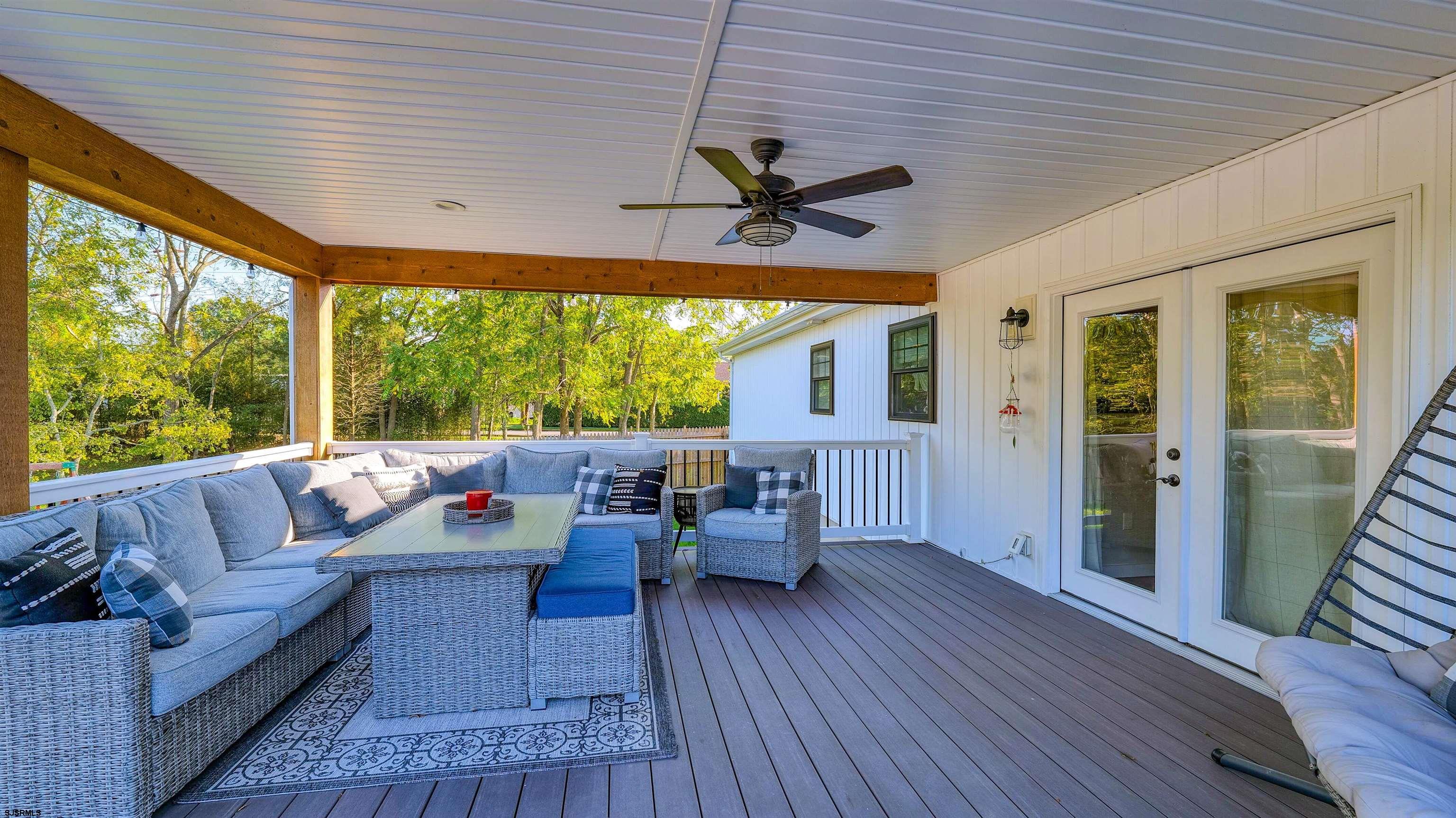 130 Stage Road Little Egg Harbor, NJ 08087 - Photo 40 of 50 a living room with furniture and a large window