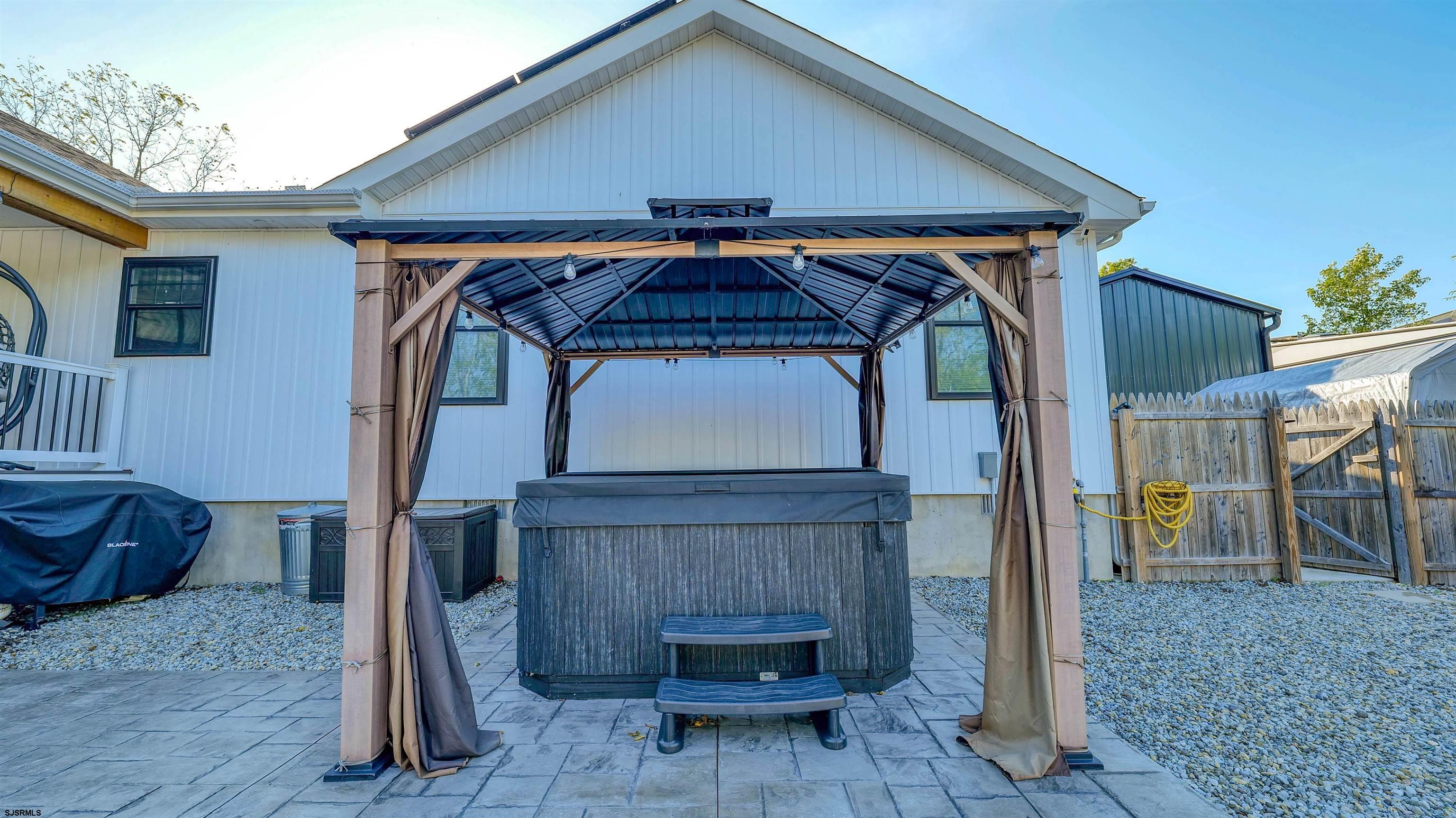 130 Stage Road Little Egg Harbor, NJ 08087 - Photo 41 of 50 a front view of a house with seating space