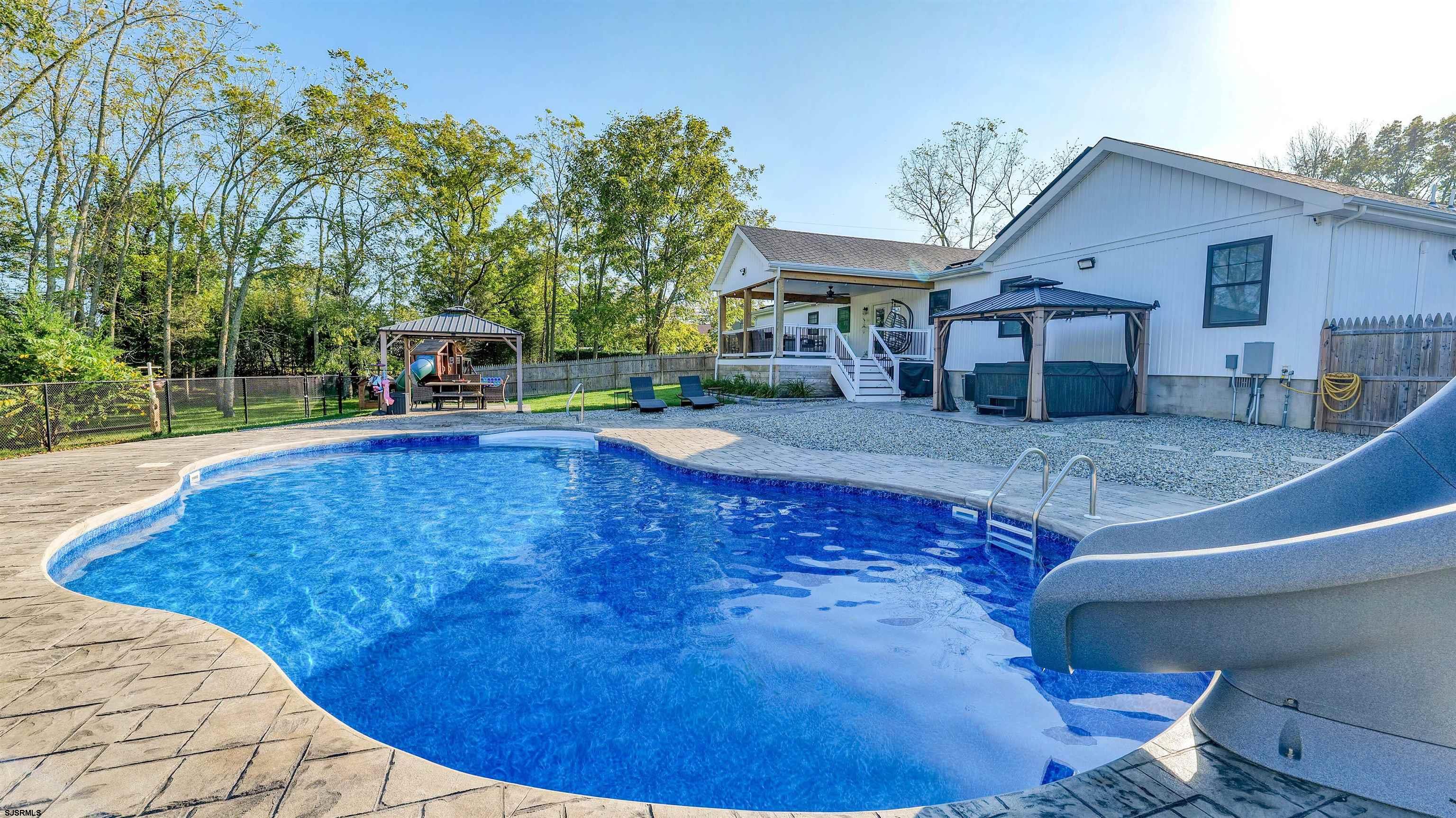 130 Stage Road Little Egg Harbor, NJ 08087 - Photo 46 of 50 a view of a house with a yard porch and sitting area