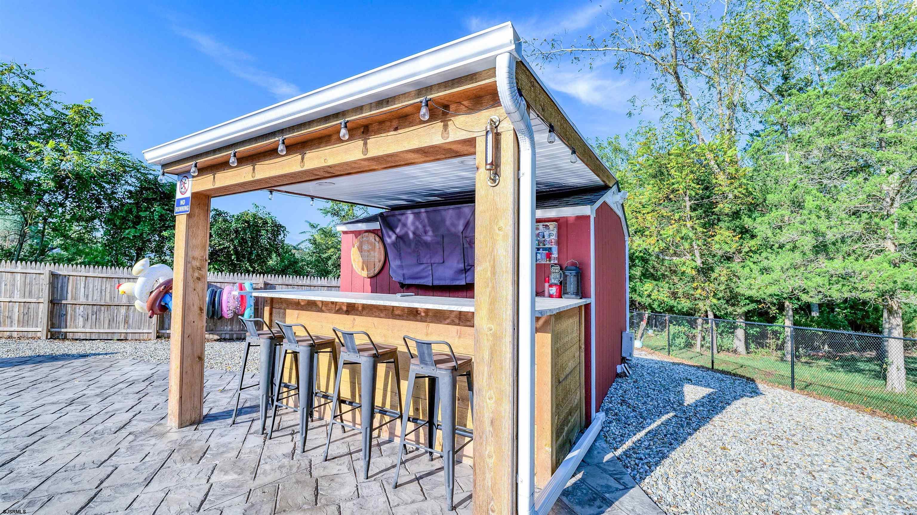 130 Stage Road Little Egg Harbor, NJ 08087 - Photo 47 of 50 a view of a chairs and table in the patio