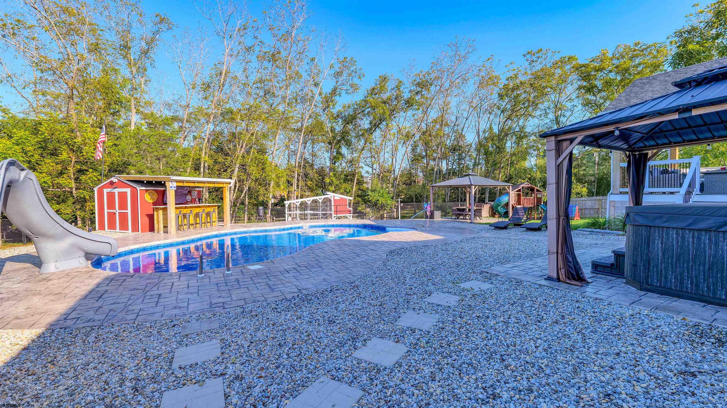 130 Stage Road Little Egg Harbor, NJ 08087 - Photo 50 of 50 a view of a house with backyard and sitting area