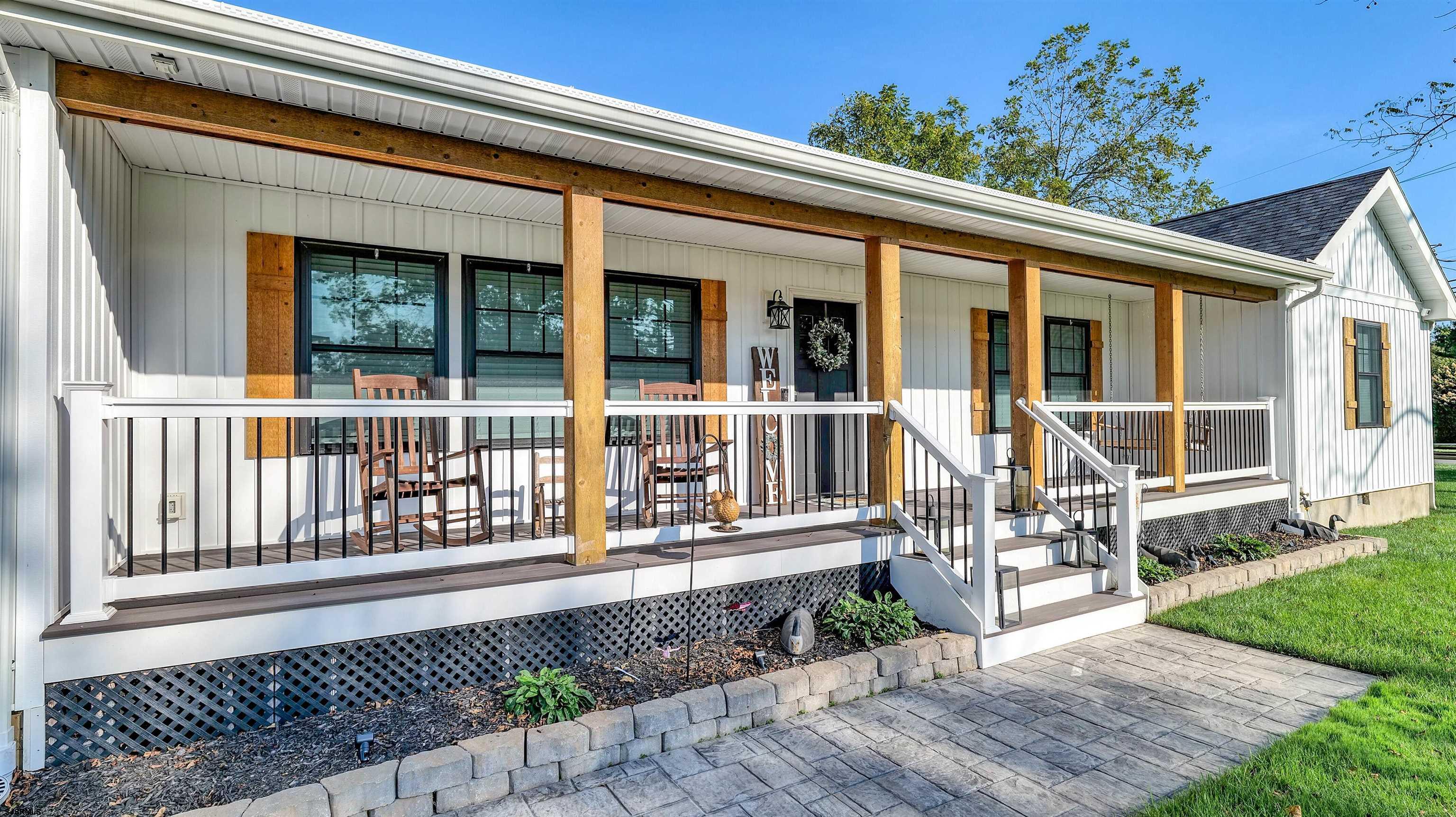 130 Stage Road Little Egg Harbor, NJ 08087 - Photo 5 of 50 a front view of a house with a porch