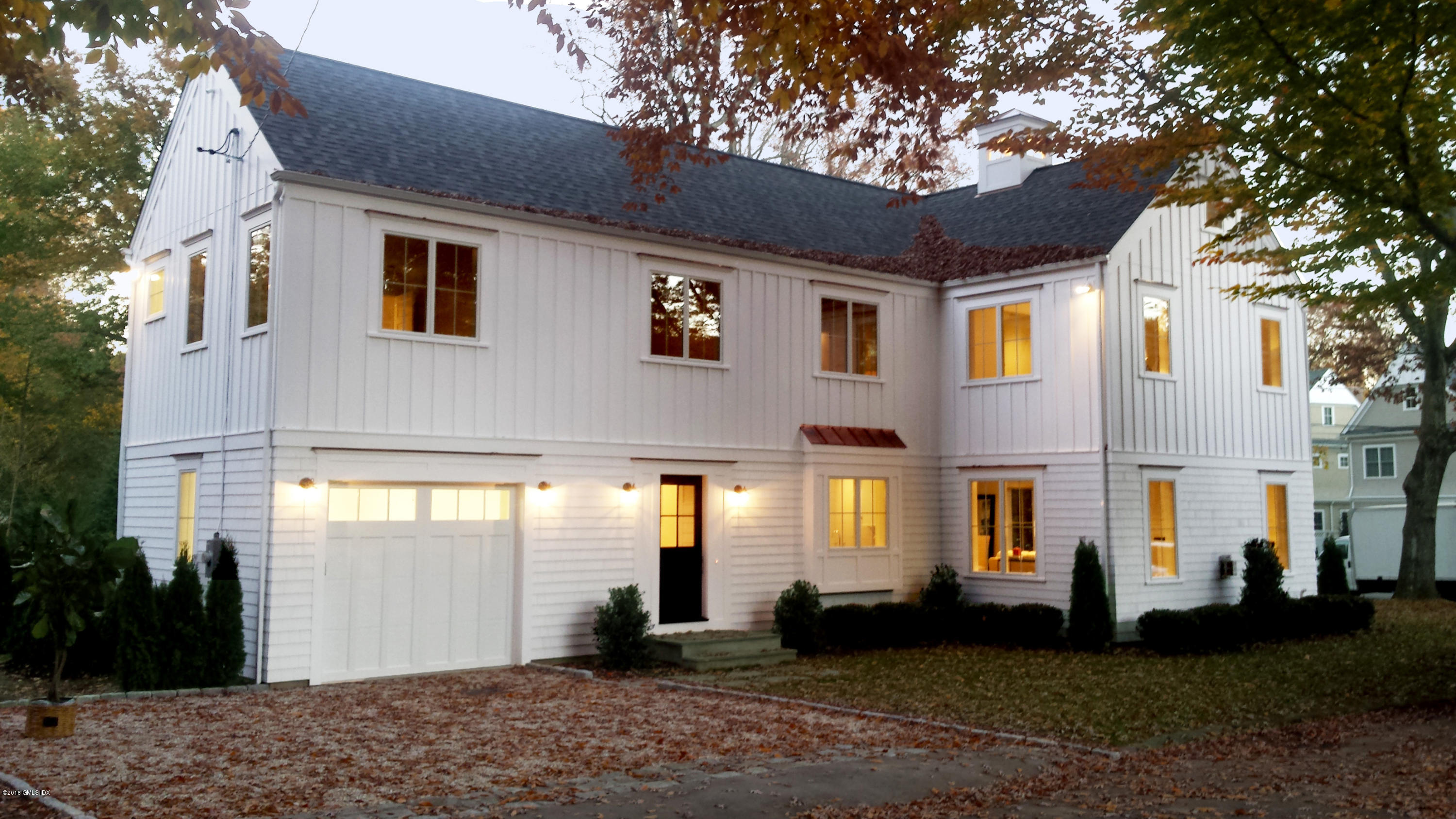 30 Edgewood Road Darien, CT 06820 - Photo 1 of 28 a front view of a house with a yard