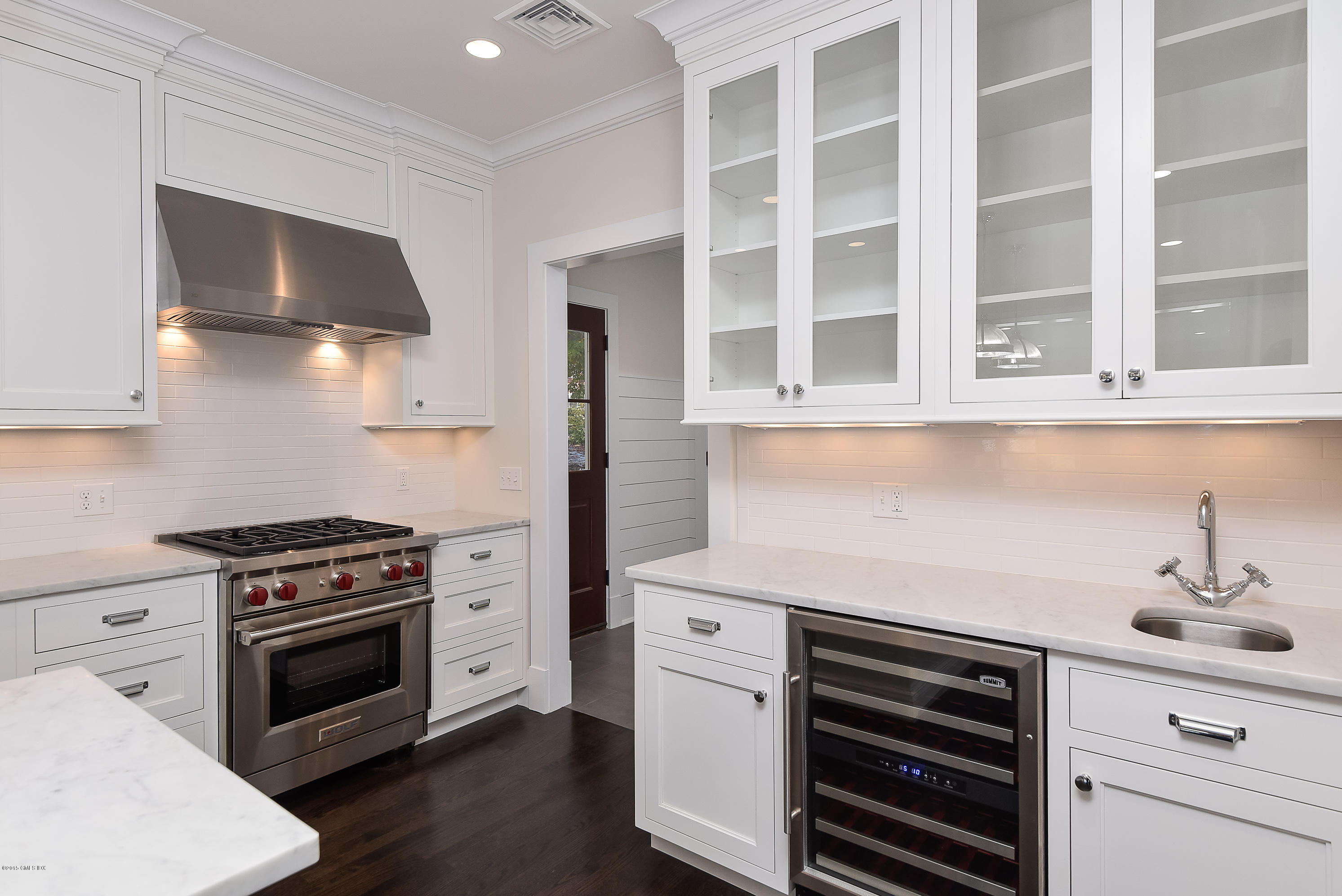 30 Edgewood Road Darien, CT 06820 - Photo 12 of 28 a kitchen with stainless steel appliances a stove and a microwave
