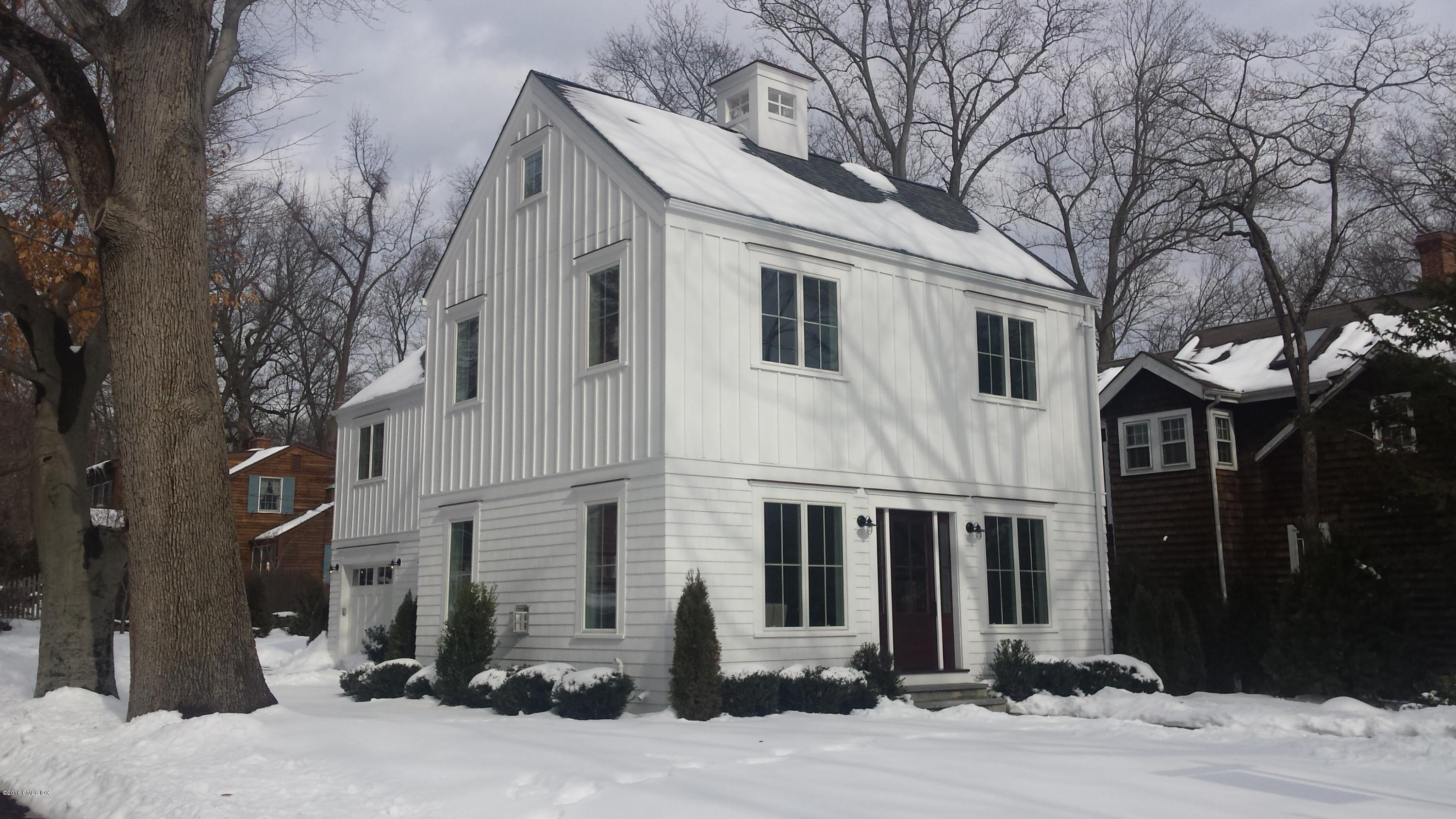 30 Edgewood Road Darien, CT 06820 - Photo 2 of 28 a front view of a house with yard