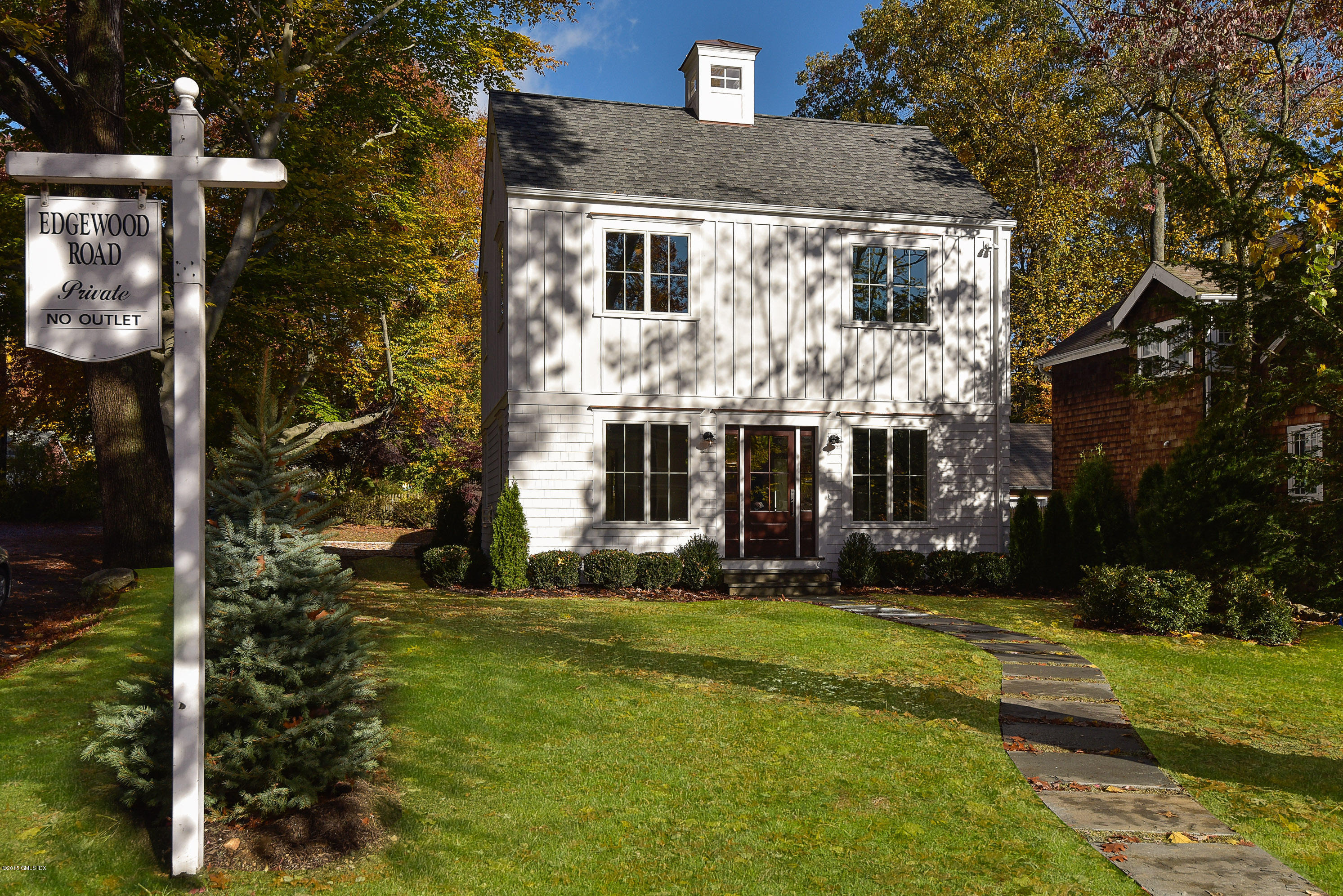 30 Edgewood Road Darien, CT 06820 - Photo 3 of 28 a front view of house with yard