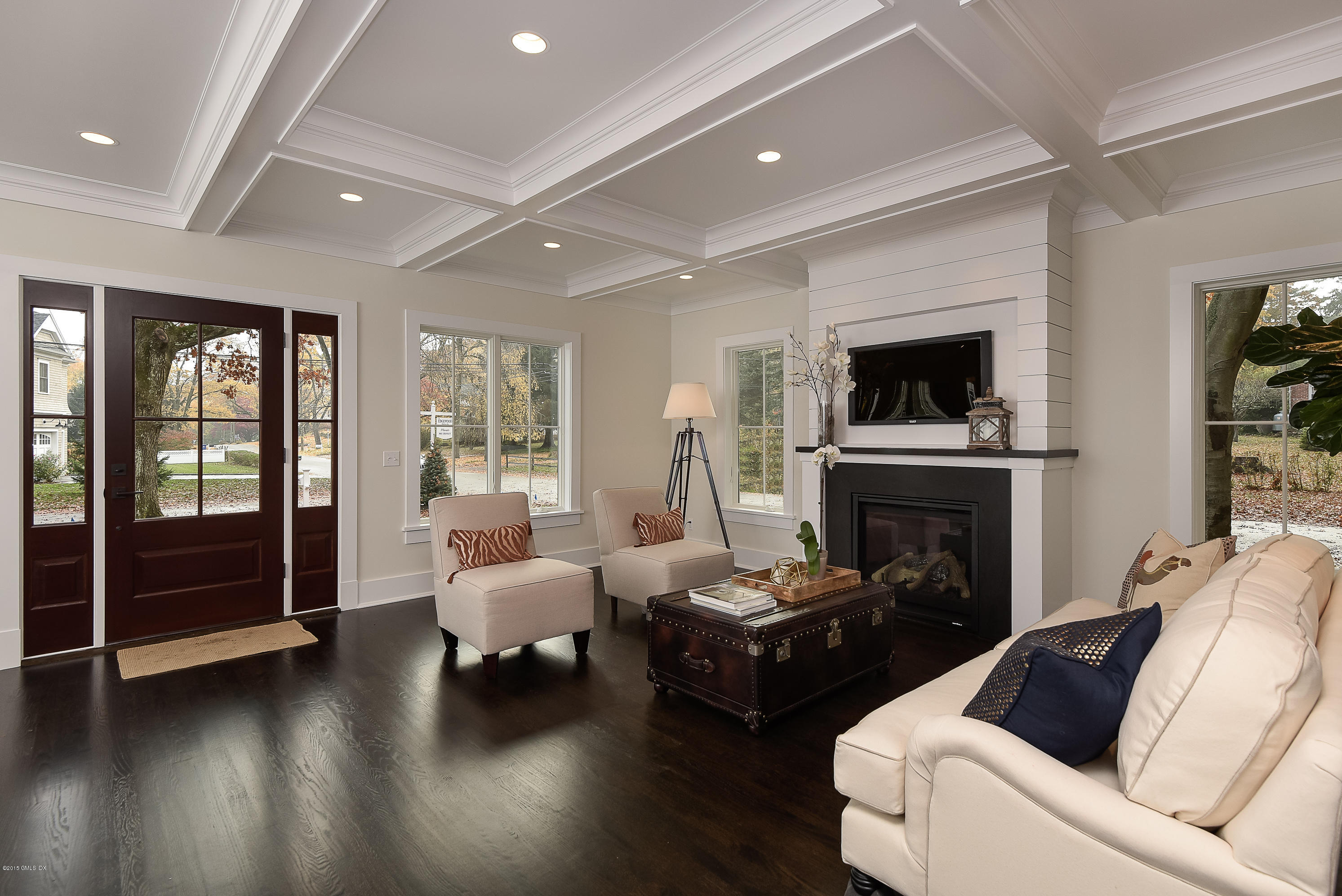 30 Edgewood Road Darien, CT 06820 - Photo 4 of 28 a living room with furniture and a fireplace