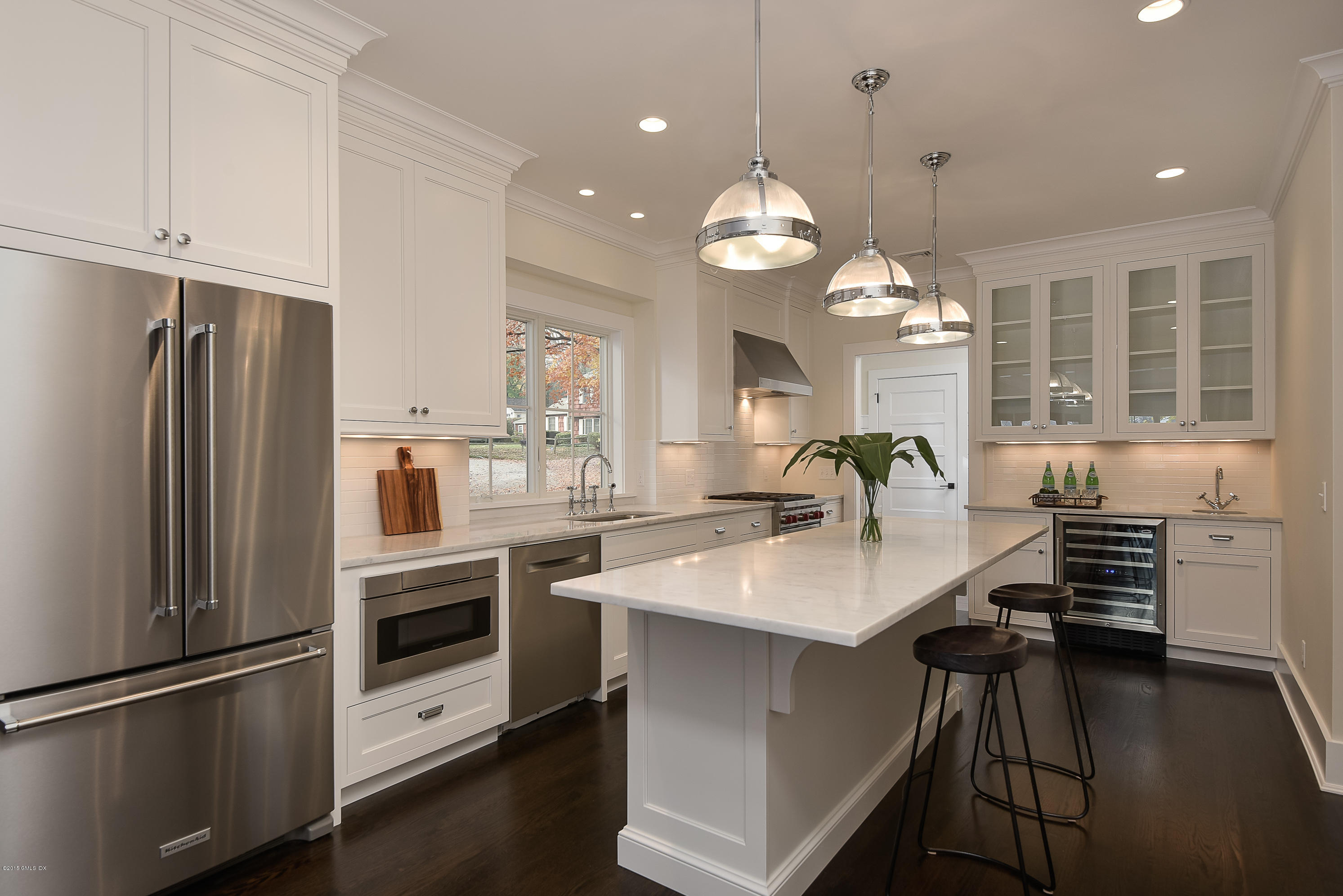 30 Edgewood Road Darien, CT 06820 - Photo 6 of 28 a kitchen with stainless steel appliances granite countertop a sink refrigerator and cabinets