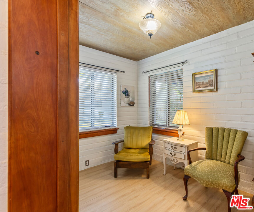4620 Cover Street Riverside, CA 92506 - Photo 19 of 42 a living room with furniture and a potted plant