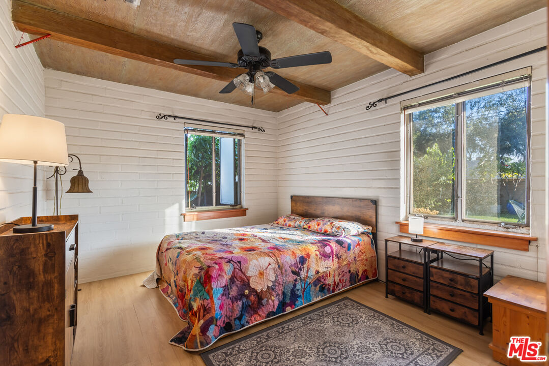 4620 Cover Street Riverside, CA 92506 - Photo 22 of 42 a bedroom with a bed and a window