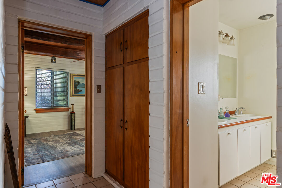 4620 Cover Street Riverside, CA 92506 - Photo 24 of 42 a view of bathroom with dual sinks