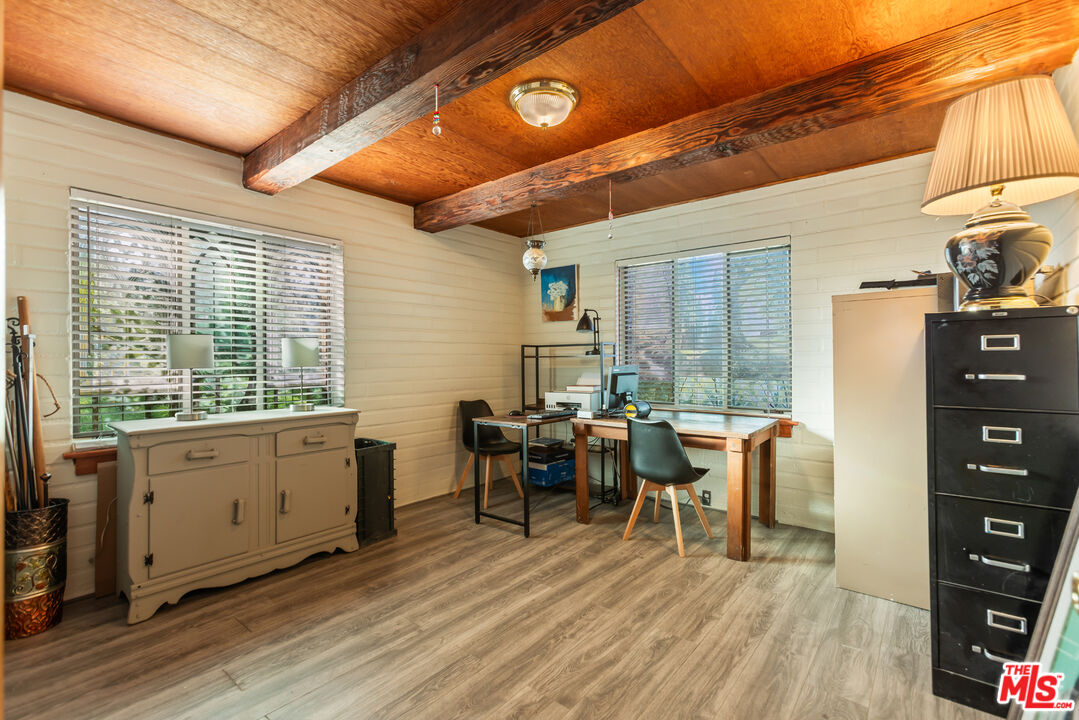 4620 Cover Street Riverside, CA 92506 - Photo 29 of 42 a very nice looking dining room with wooden floor and furniture