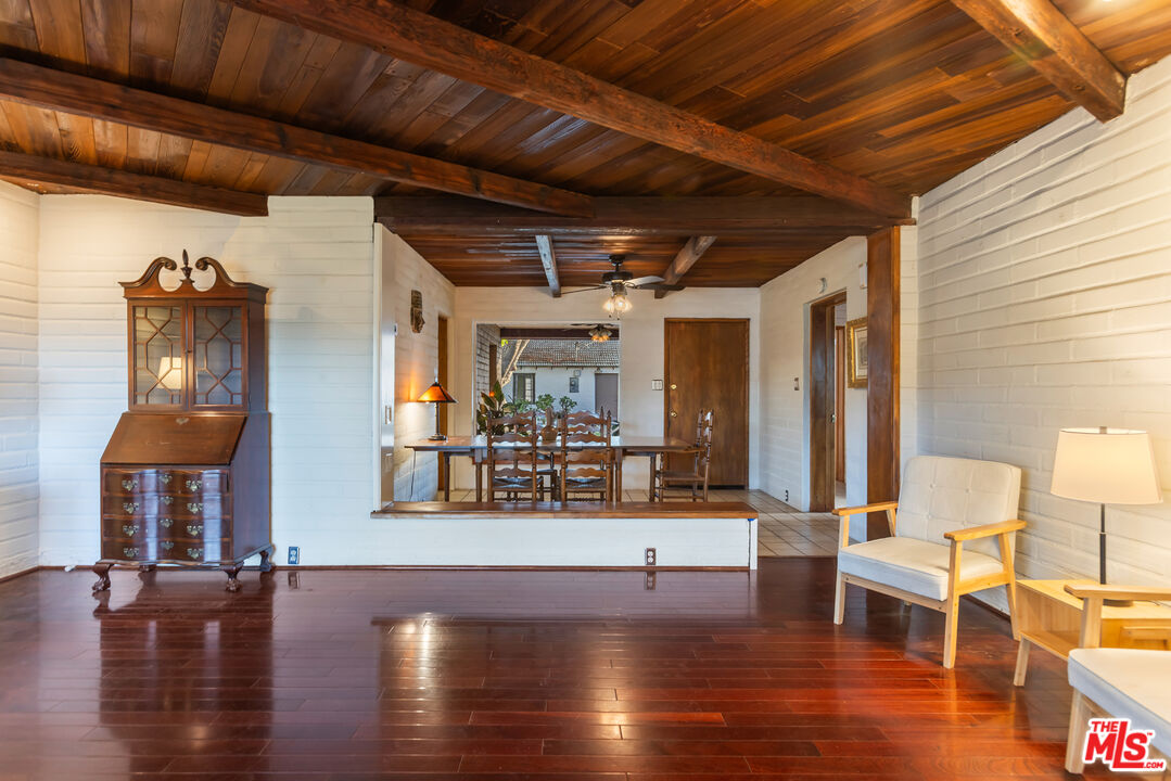 4620 Cover Street Riverside, CA 92506 - Photo 7 of 42 a dining room with wooden floor table and chairs
