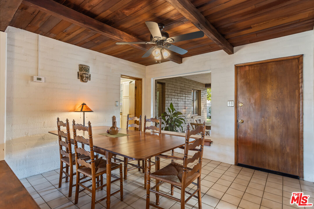 4620 Cover Street Riverside, CA 92506 - Photo 8 of 42 a dining room with furniture and window