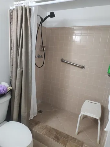 a view of a balcony with chairs