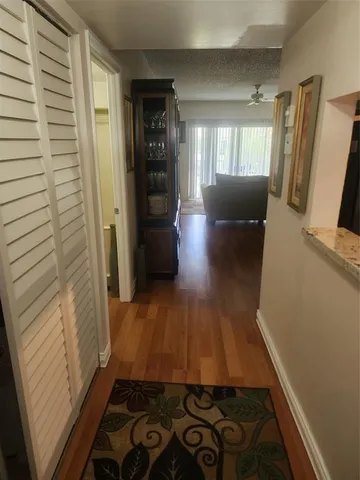 a view of entryway with wooden floor