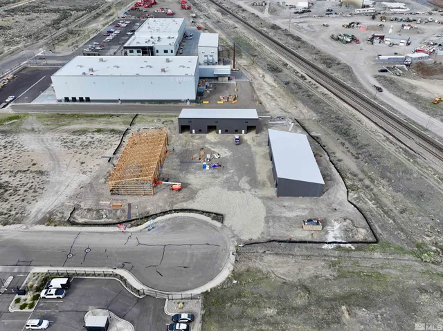 an aerial view of a highlighted house
