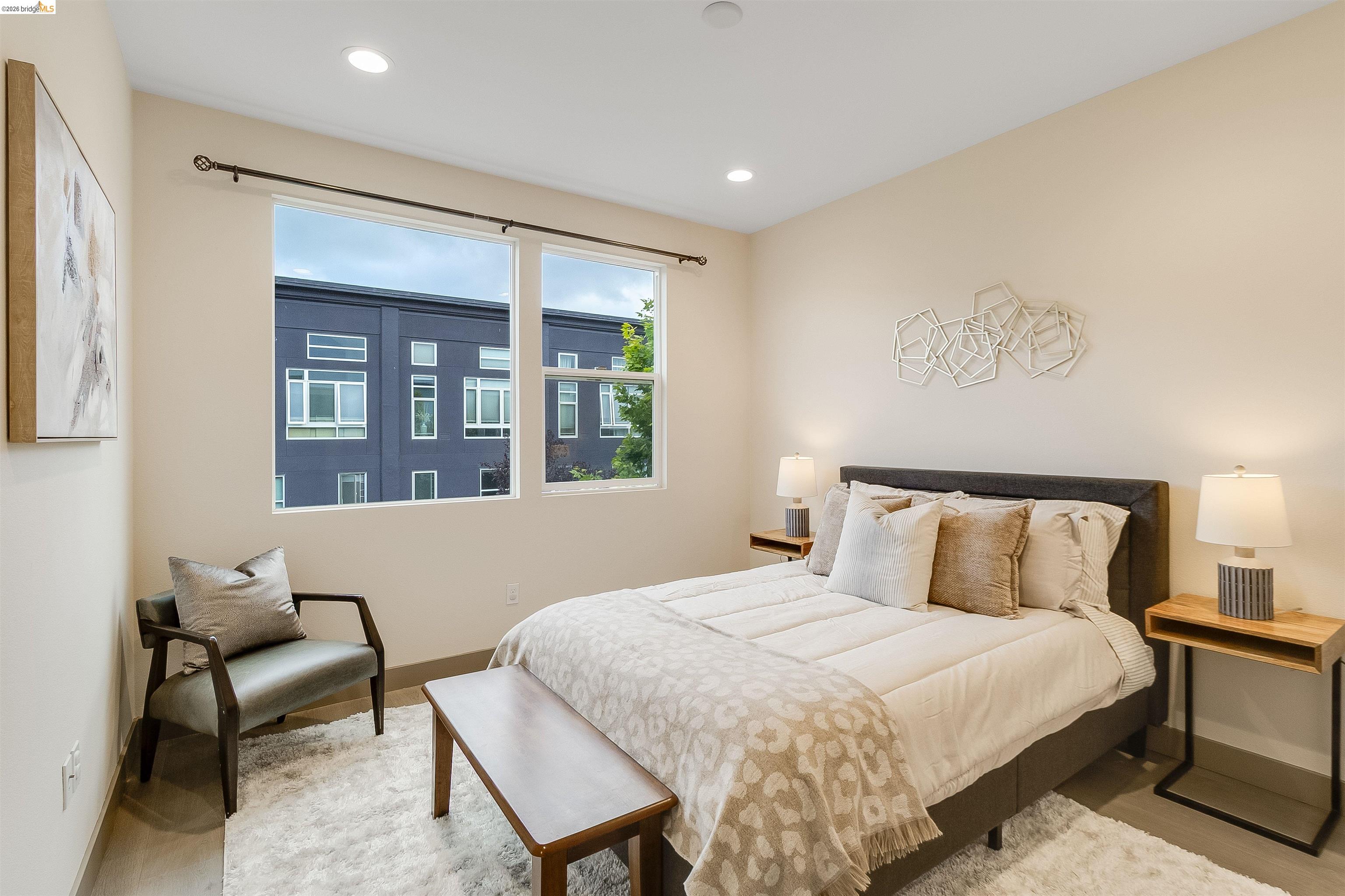 1357 Pullman Way Oakland, CA 94607 - Photo 28 of 37 Spacious bedroom featuring light-toned walls and wood-finish flooring
