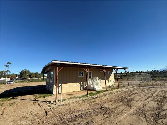 a view of swimming pool with a patio