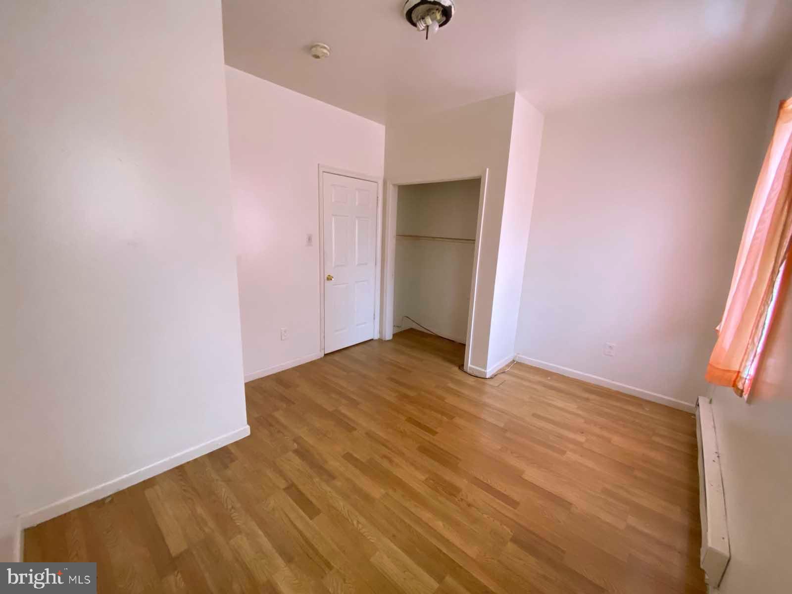 2832 Ormes Street Philadelphia, PA 19134 - Photo 20 of 28 a view of empty room with wooden floor