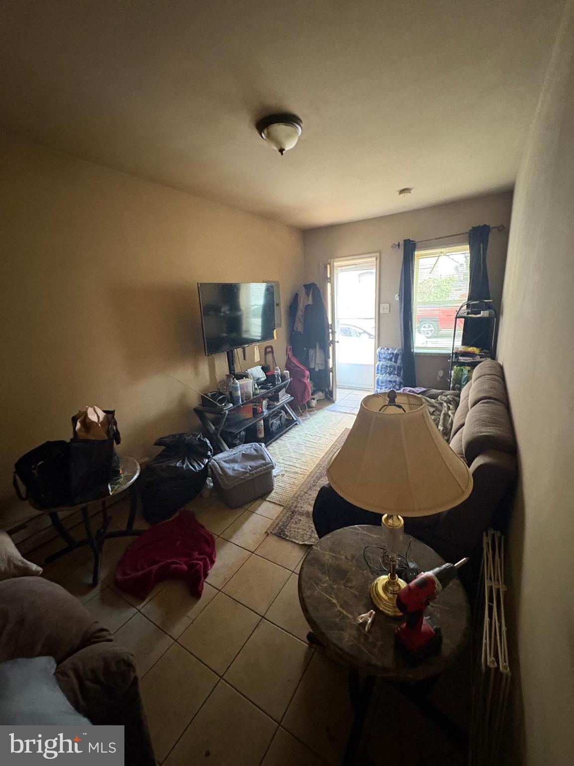 2832 Ormes Street Philadelphia, PA 19134 - Photo 3 of 28 a living room with furniture and a window