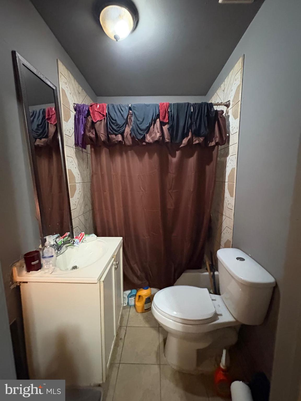 2832 Ormes Street Philadelphia, PA 19134 - Photo 8 of 28 a bathroom with a sink toilet and shower