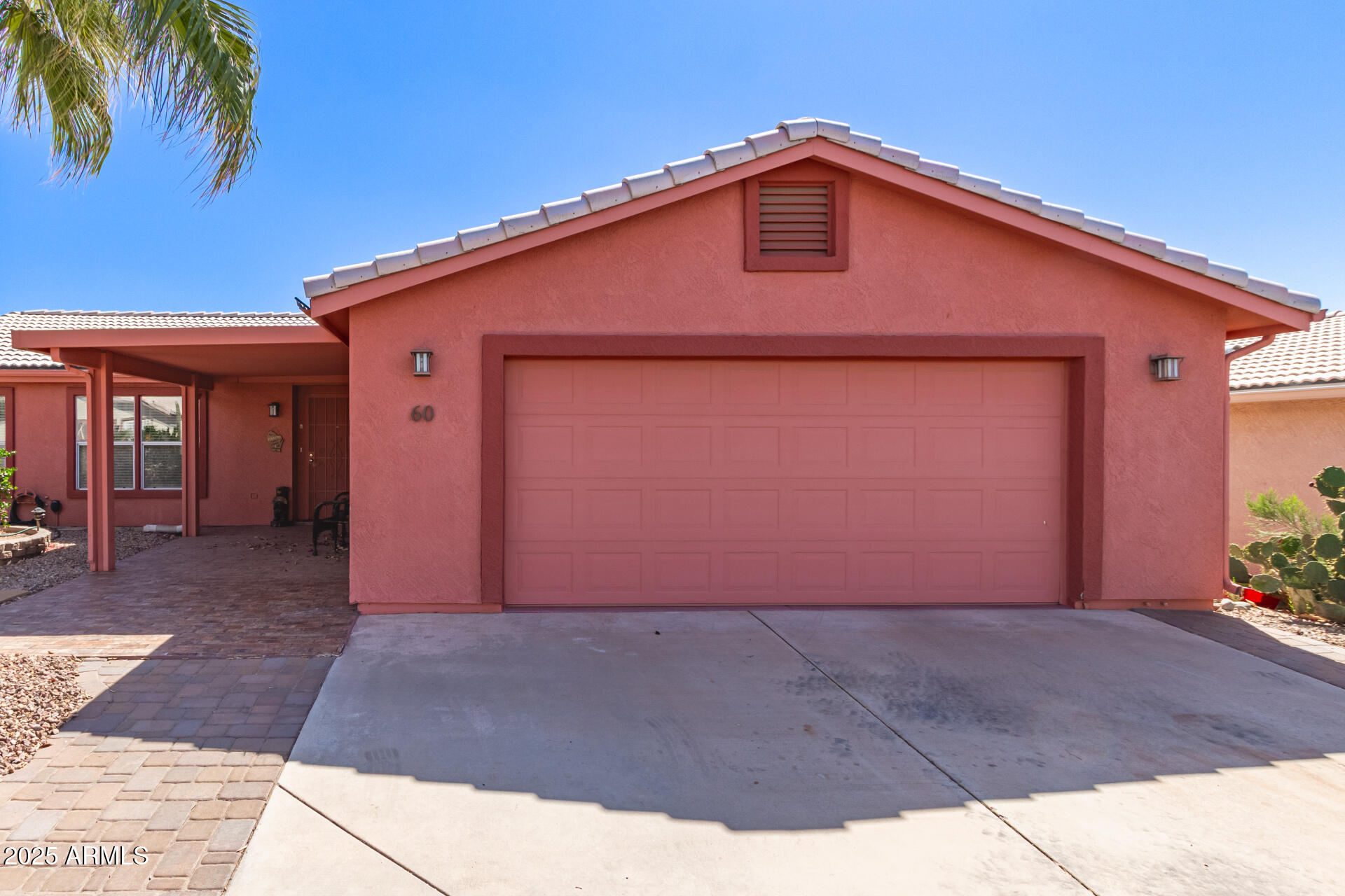 2101 South Meridian Road, Unit 60 Apache Junction, AZ 85120 - Photo 5 of 35 a front view of a house