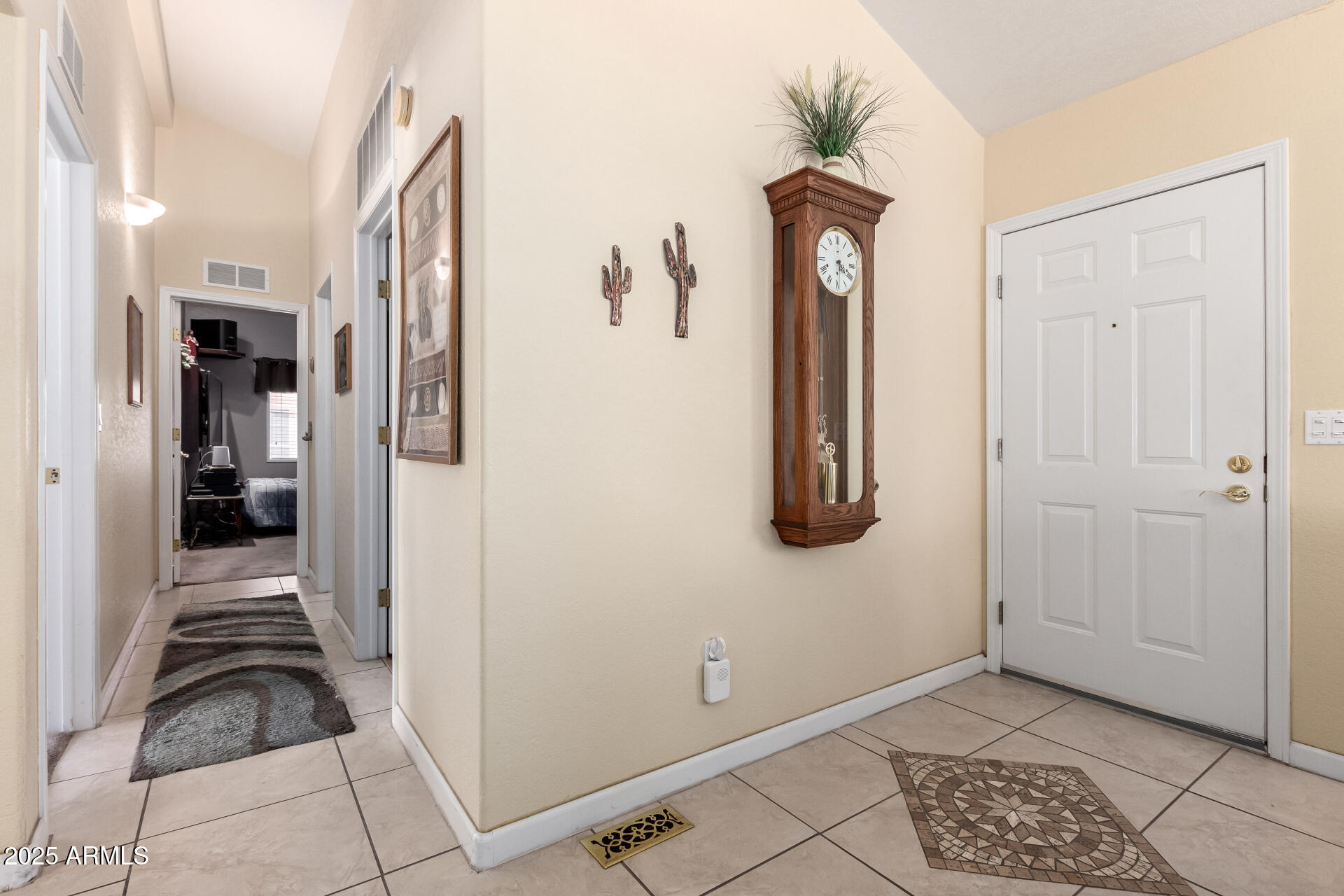 2101 South Meridian Road, Unit 60 Apache Junction, AZ 85120 - Photo 8 of 35 a view of hallway with walk in closet and wooden floor