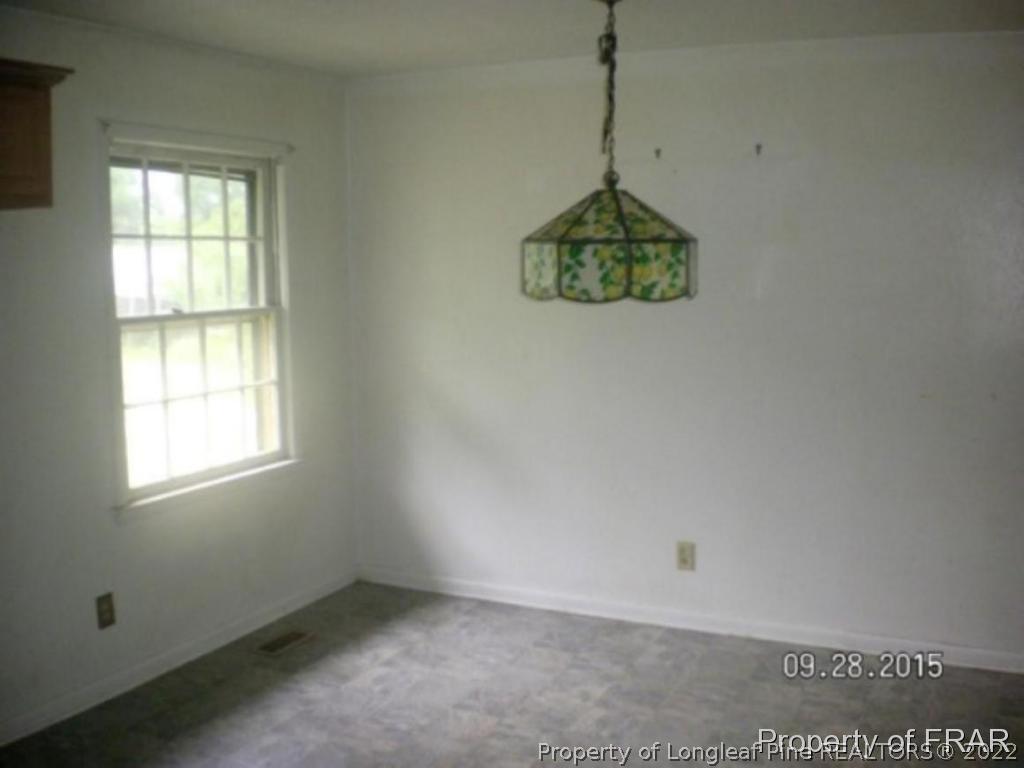 2258 Shaw Rd Extension Fayetteville, NC 28311 - Photo 8 of 16 an empty room with a window