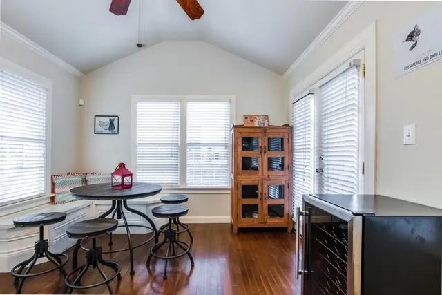 a livingroom with a window and furniture