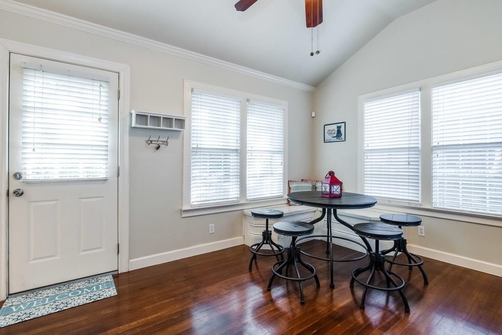 2404 Thornton Road, Unit A Austin, TX 78704 - Photo 7 of 31 a view of a dining room with furniture window and wooden floor