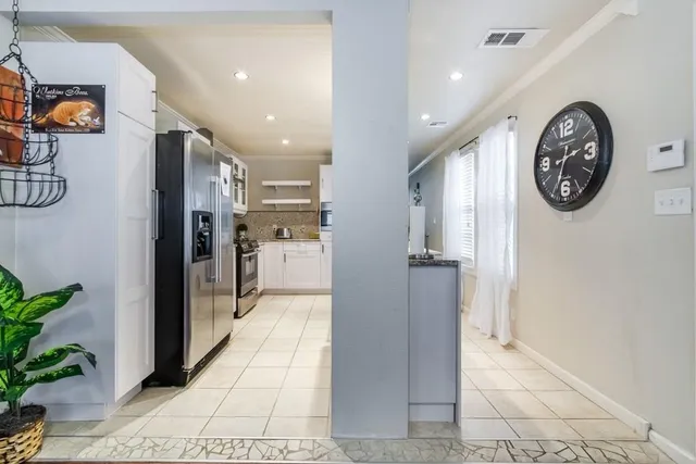 a view of a hallway with elevator