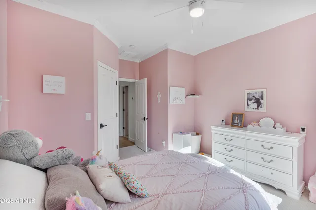 a view of a house with a garden and pathway