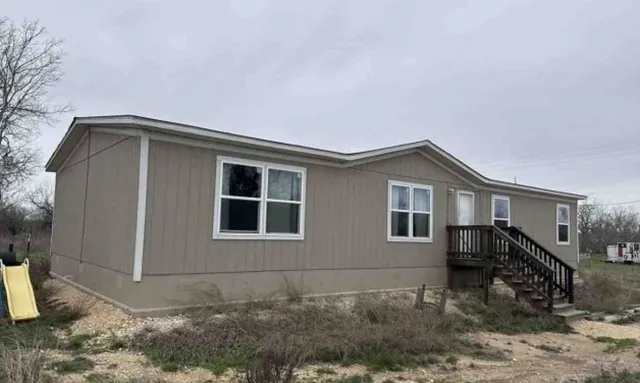 a front view of a house with windows