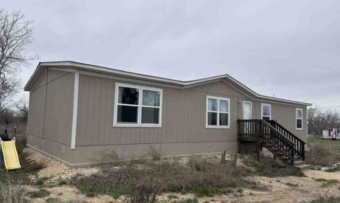 a front view of a house with windows