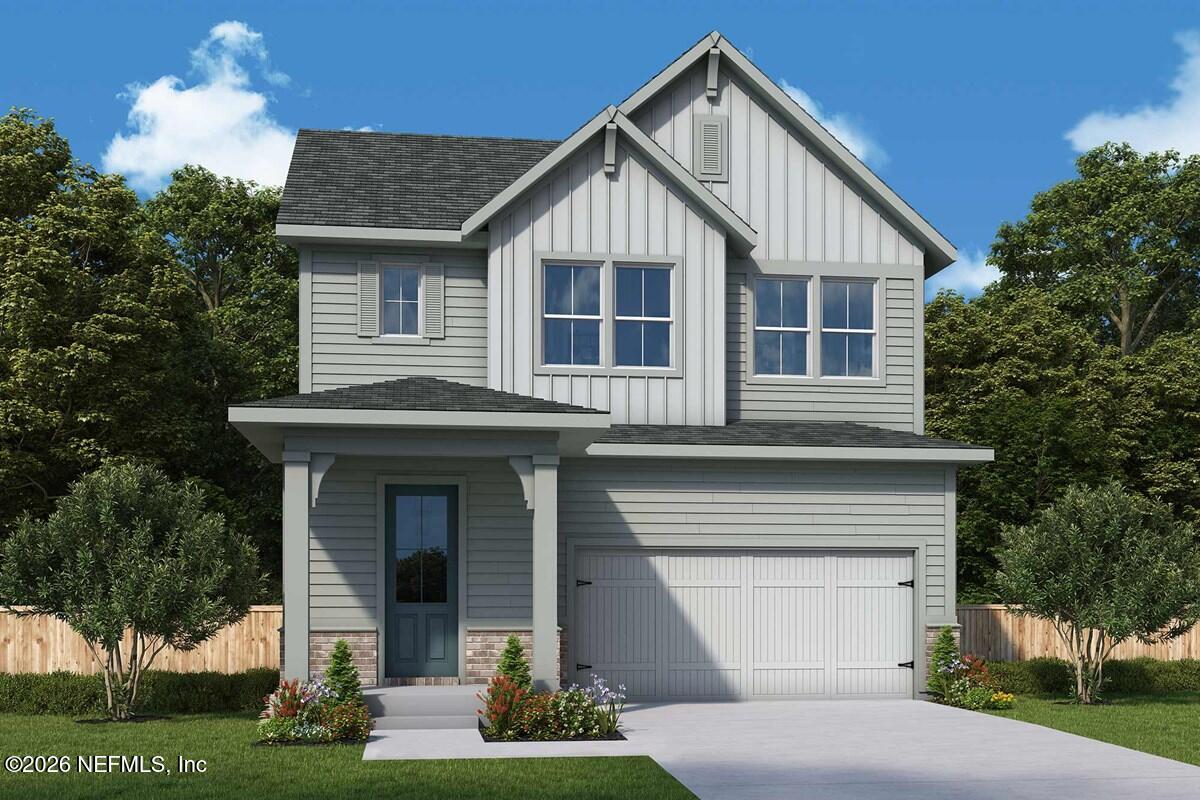 6028 Timber Pines Road Jacksonville, FL 32224 - Photo 1 of 3 a front view of a house with garden