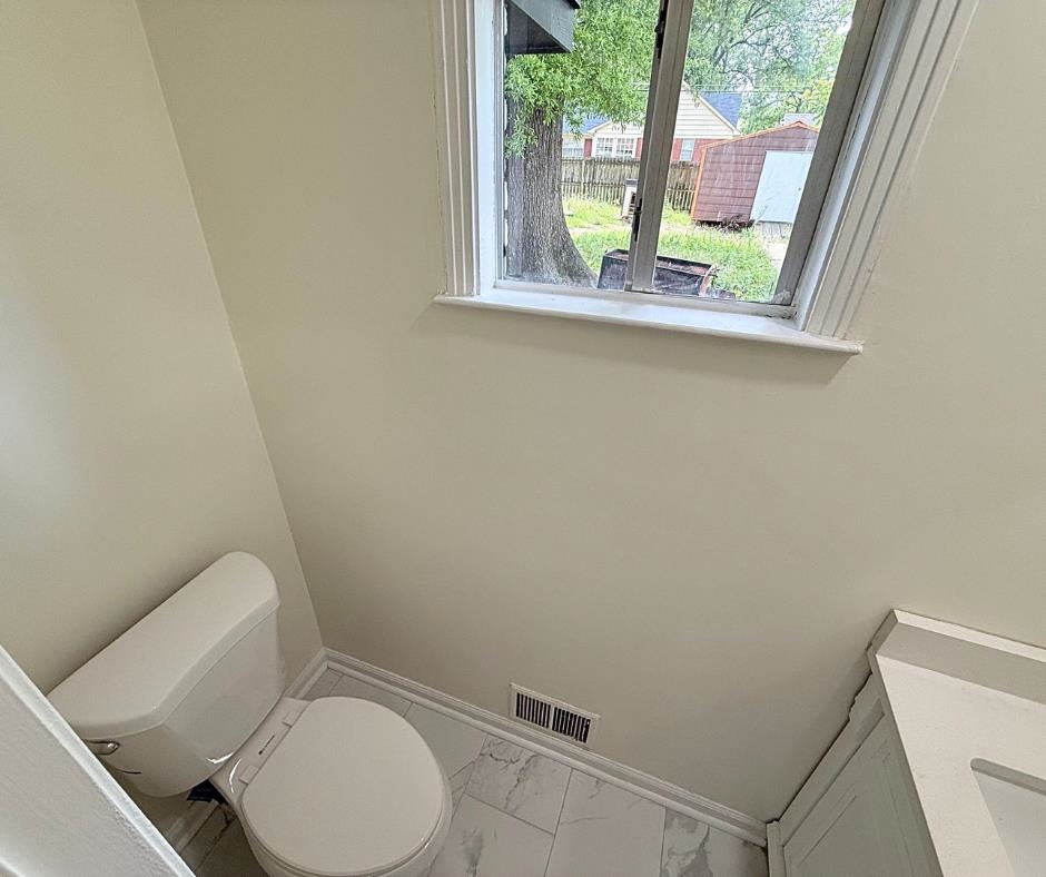3969 Millbranch Road Memphis, TN 38116 - Photo 13 of 33 Bathroom featuring marble finish floors and vanity