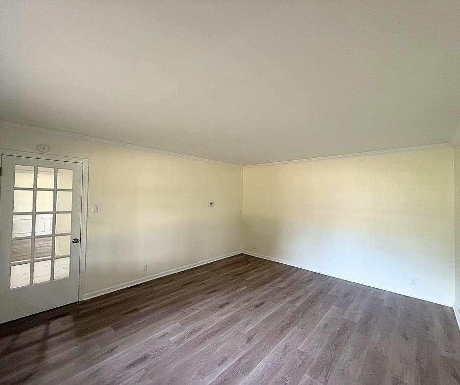 3969 Millbranch Road Memphis, TN 38116 - Photo 18 of 33 Unfurnished room featuring wood finished floors and ornamental molding