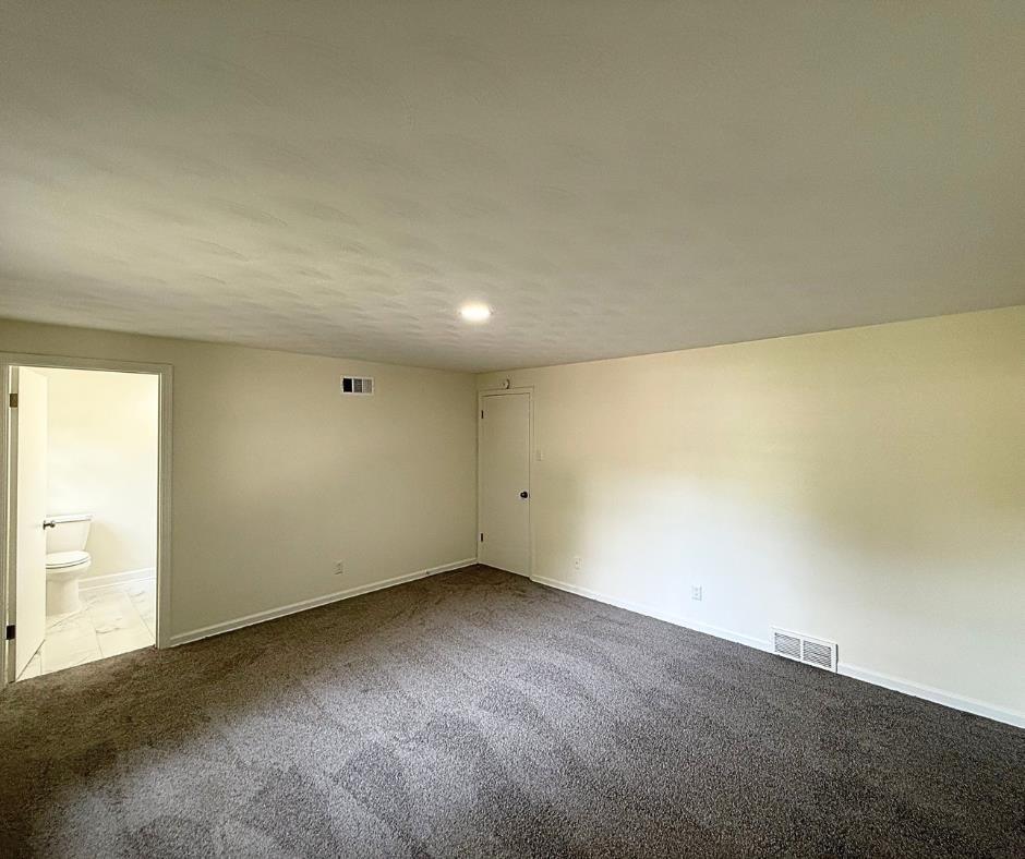 3969 Millbranch Road Memphis, TN 38116 - Photo 27 of 33 Carpeted spare room with baseboards