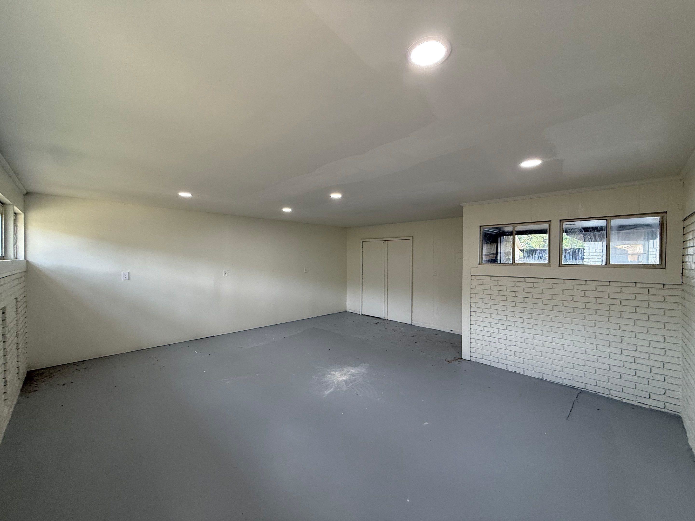3969 Millbranch Road Memphis, TN 38116 - Photo 31 of 33 Not central heating and air. featuring recessed lighting and brick wall