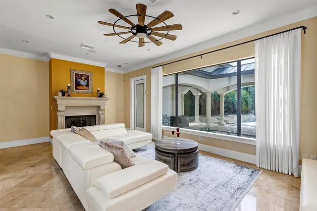 a kitchen with kitchen island granite countertop a sink stove and refrigerator