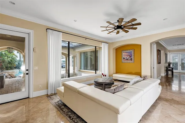 a kitchen with granite countertop a sink and cabinets