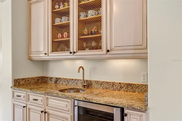 a bedroom with a bed and large window
