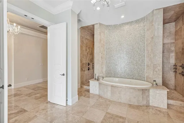 a bathroom with a granite countertop toilet sink and mirror